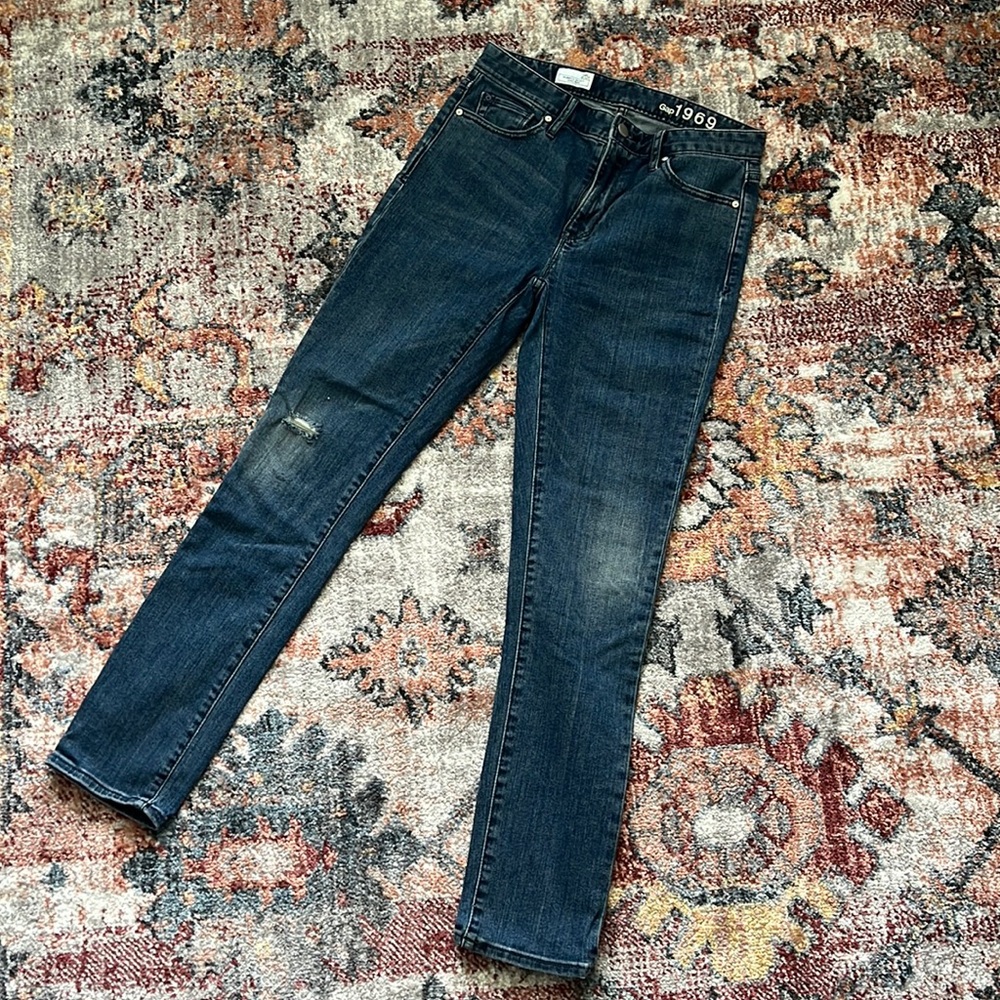 Gap Always Skinny High Rise Jean.  Medium blue semi distressed at one knee 25r